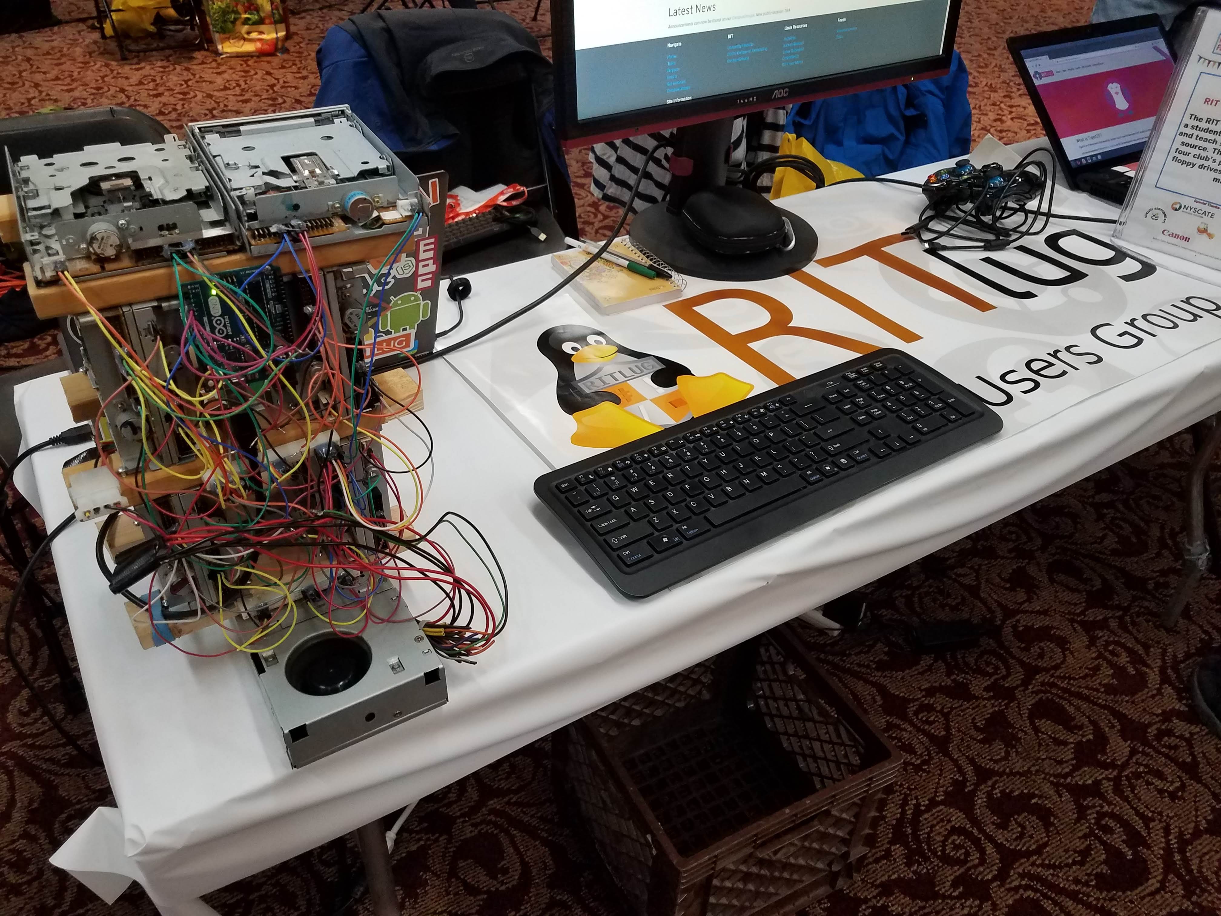 Rochester Maker Faire RITlug table.